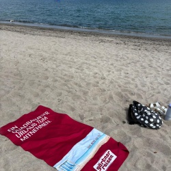 G&auml;rtner Reisen Handtuch am Timmendorfer Strand
